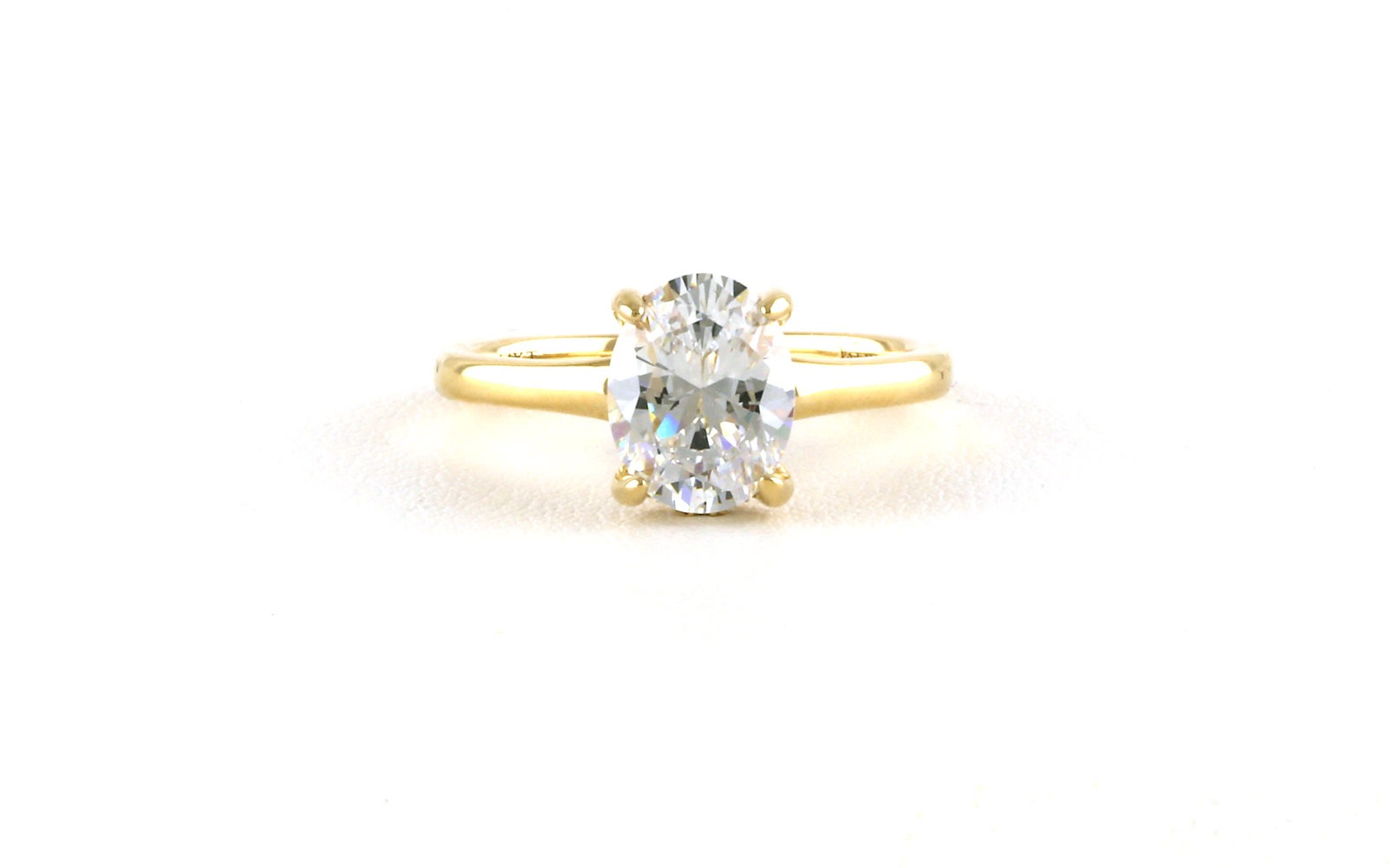 Hidden Halo-style Oval-cut Engagement Ring Mounting in Yellow Gold
