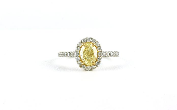 content/products/Halo-style Oval Fancy Yellow Diamond Ring in Two-tone White and Yellow Gold