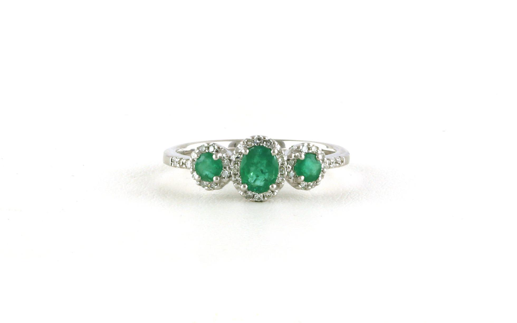 Estate Piece: 3-Stone Halo-style Oval-cut Emerald and Diamond Ring in White Gold (0.75cts TWT)