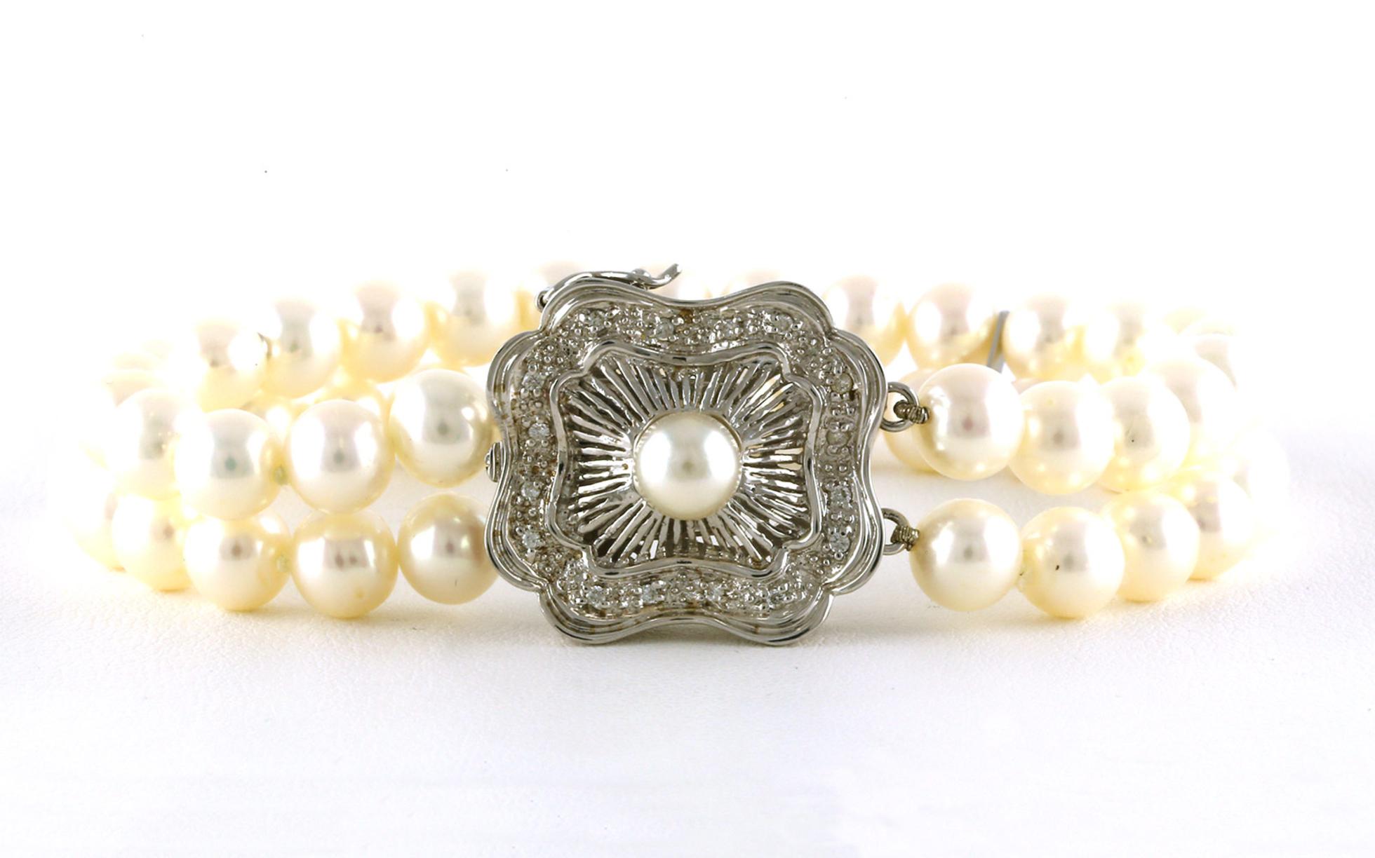 Estate Piece: Double Strand Pearl and Diamond Bracelet with Filigree Clasp in White Gold