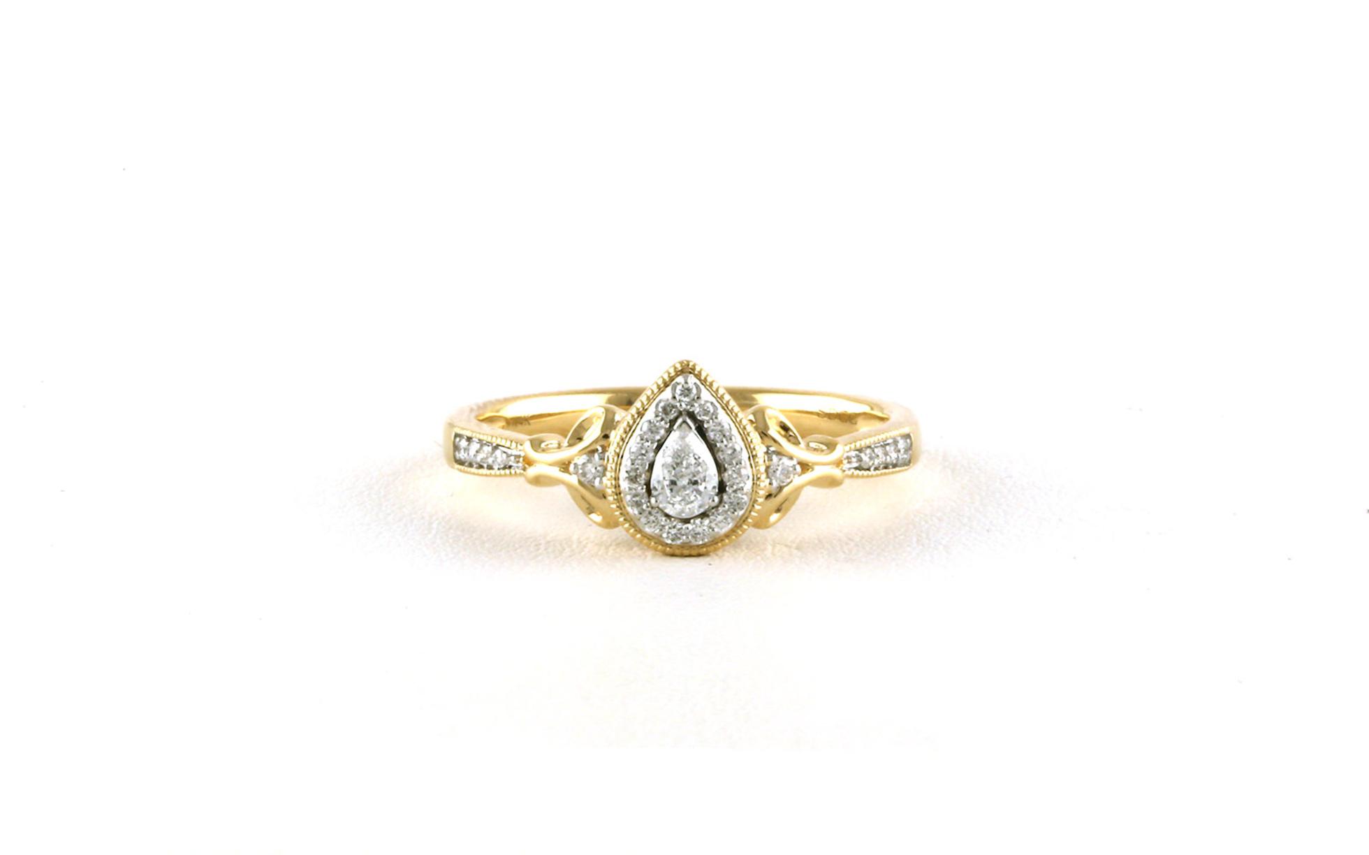 Halo-style Pear-cut Diamond Engagement Ring in Yellow Gold (0.25cts TWT)