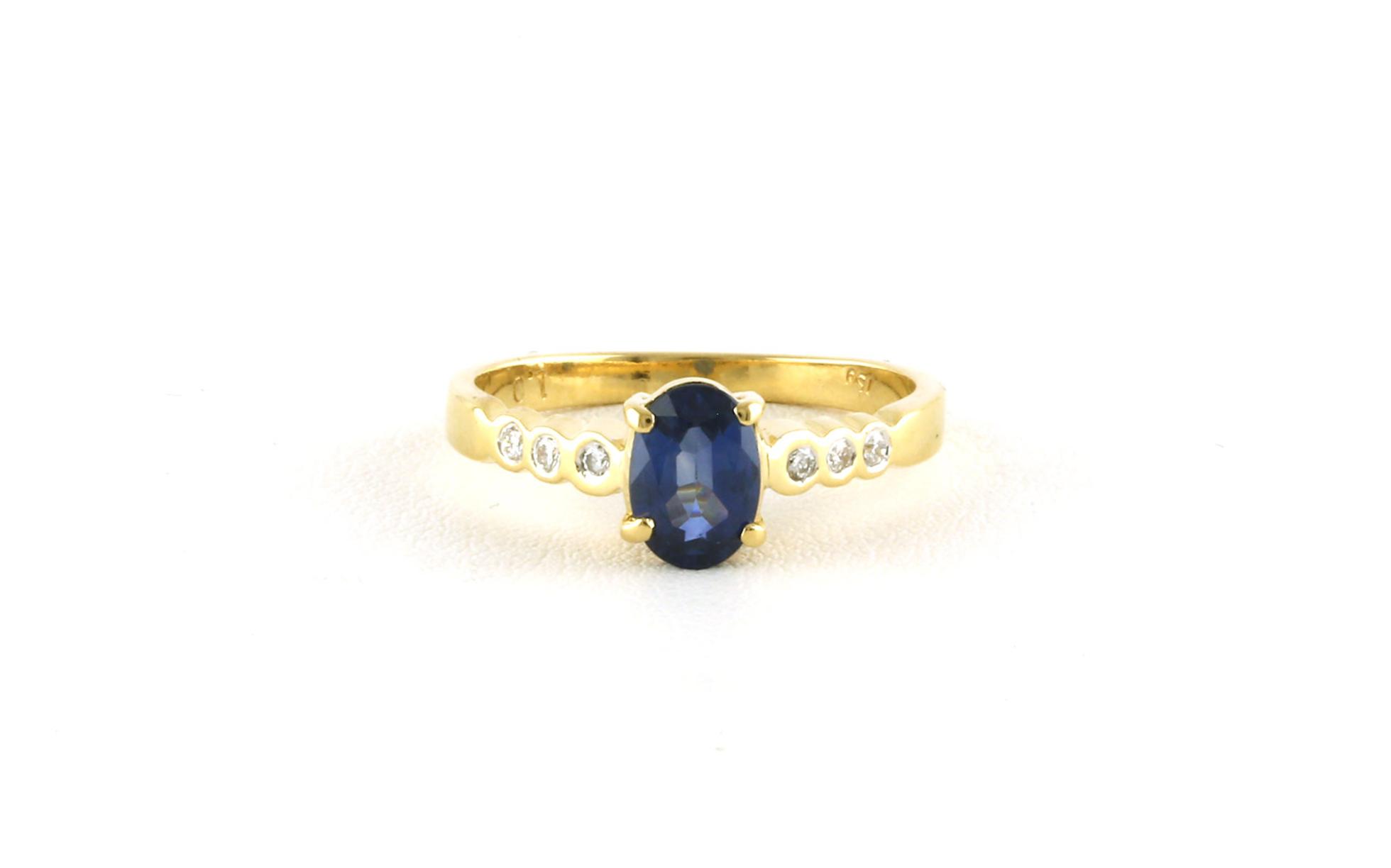 Estate Piece: 7-Stone Oval-cut Sapphire and Bezel-set Diamond Ring in Yellow Gold (0.86cts TWT)