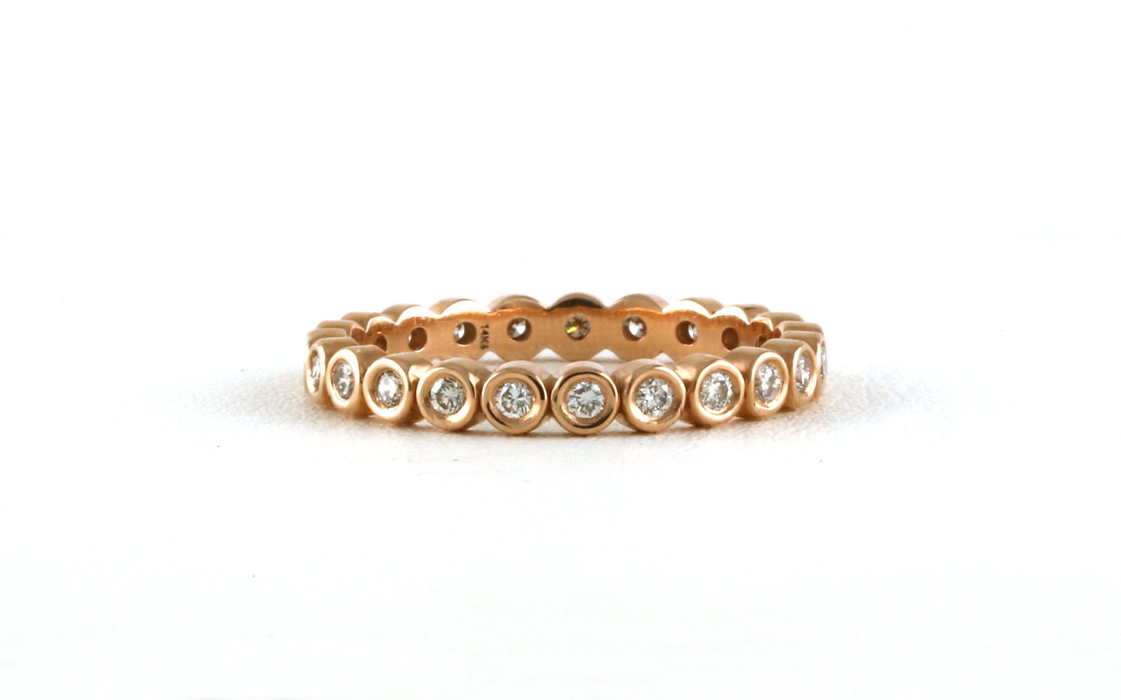Bezel Set Diamond Eternity Band in Rose Gold