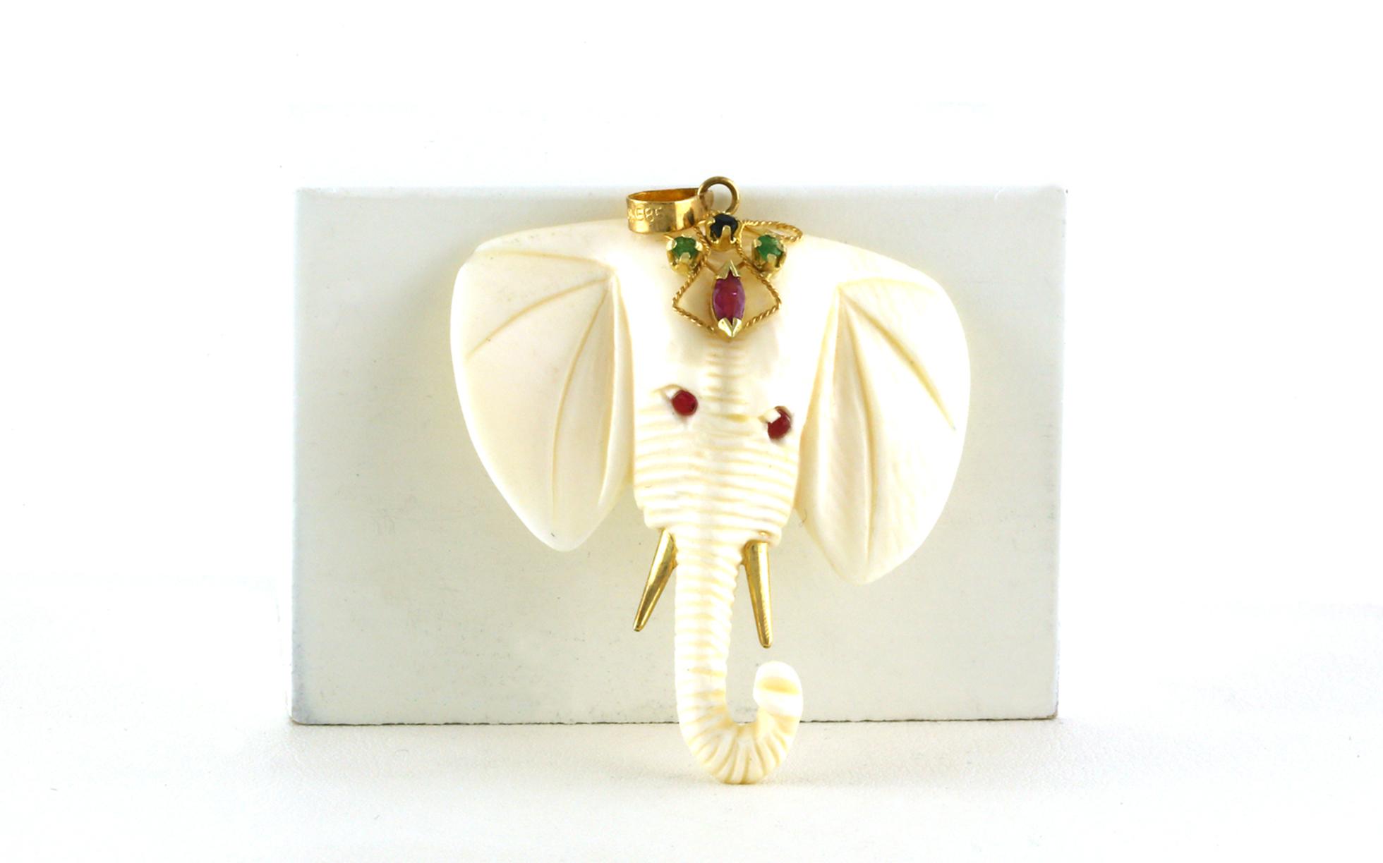 Estate Piece: Small Bone Elephant Pendant with Rubies, and Emeralds in Yellow Gold