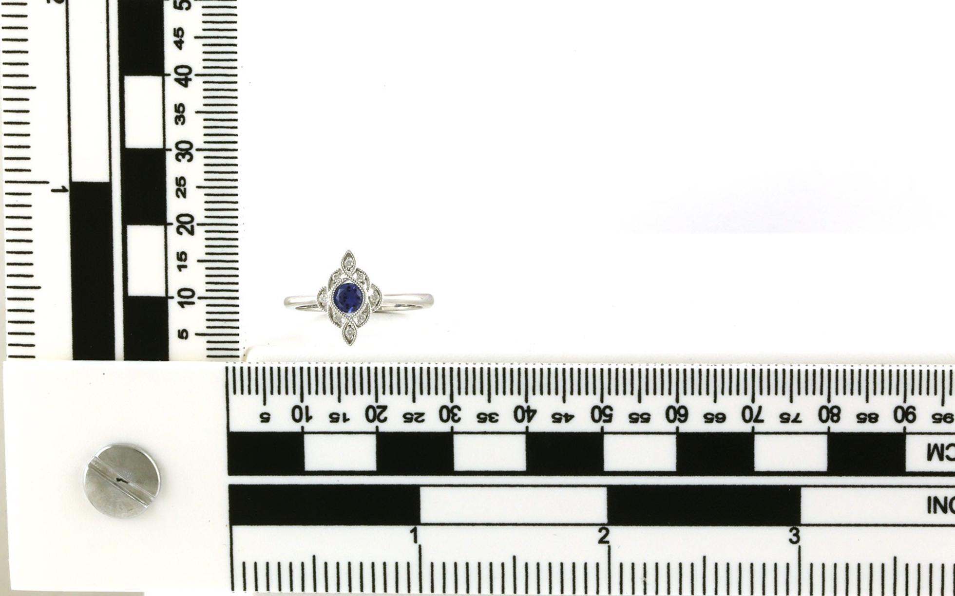 Vintage Halo-style Montana Yogo Sapphire and Diamond Ring with Milgrain Details in White Gold (0.40cts TWT) scale