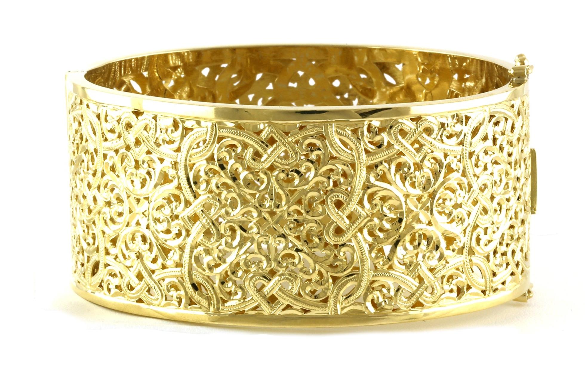 Estate Piece: Wide Filigree Hinged Bangle Bracelet in Yellow Gold
