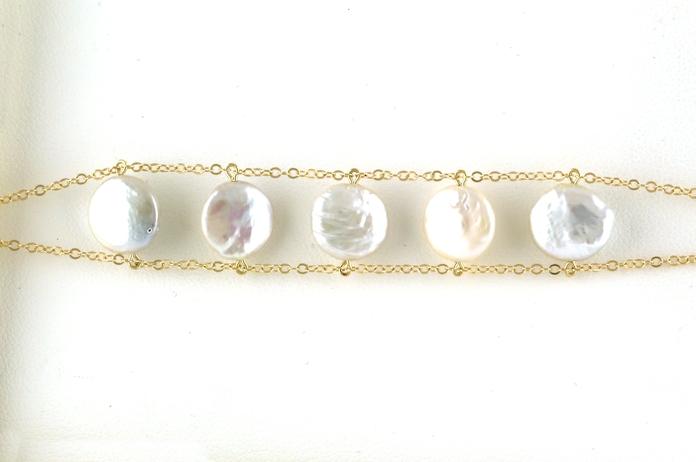 content/products/5-Stone Double Strand Threaded Pearl Bracelet in Yellow Gold 