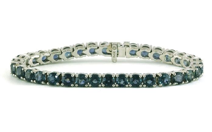 content/products/Teal Montana Sapphire Tennis Bracelet in White Gold (23.03cts TWT)
