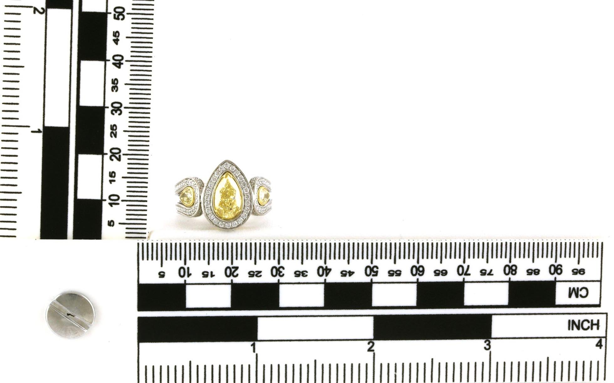Estate Piece: 3-Stone Halo-style Pear-cut Yellow and White Diamond Ring in Two-tone White and Yellow (0.97cts TWT) scale