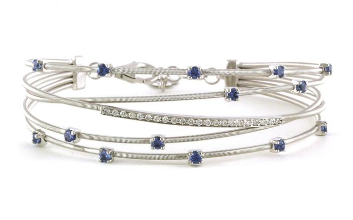 content/products/Wide Overlapping Montana Yogo Sapphire and Diamond Flexible Bangle Bracelet in White Gold (1.08cts TWT)