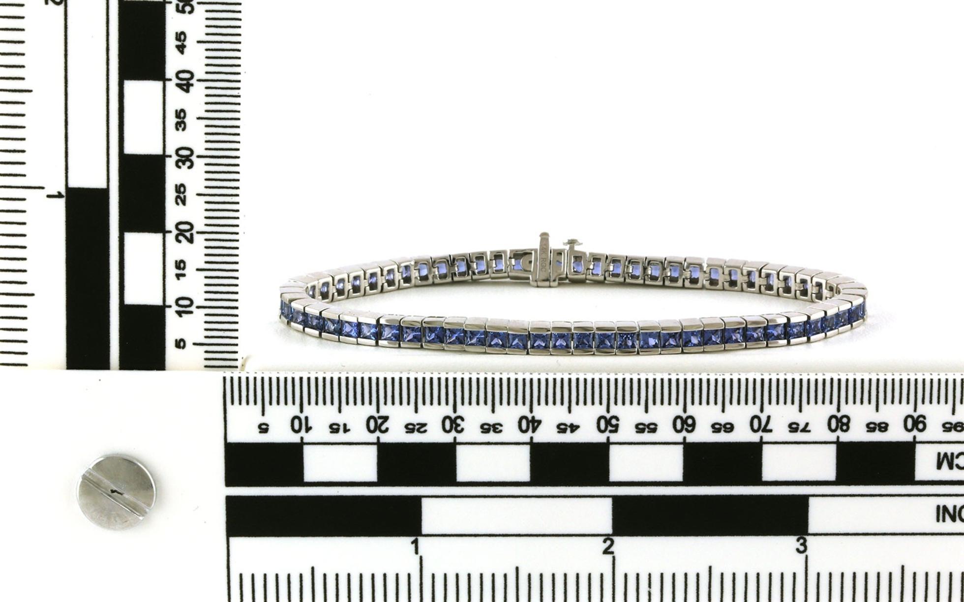 Bar-set Montana Yogo Sapphire Tennis Bracelet in White Gold (7.63cts TWT) Scale