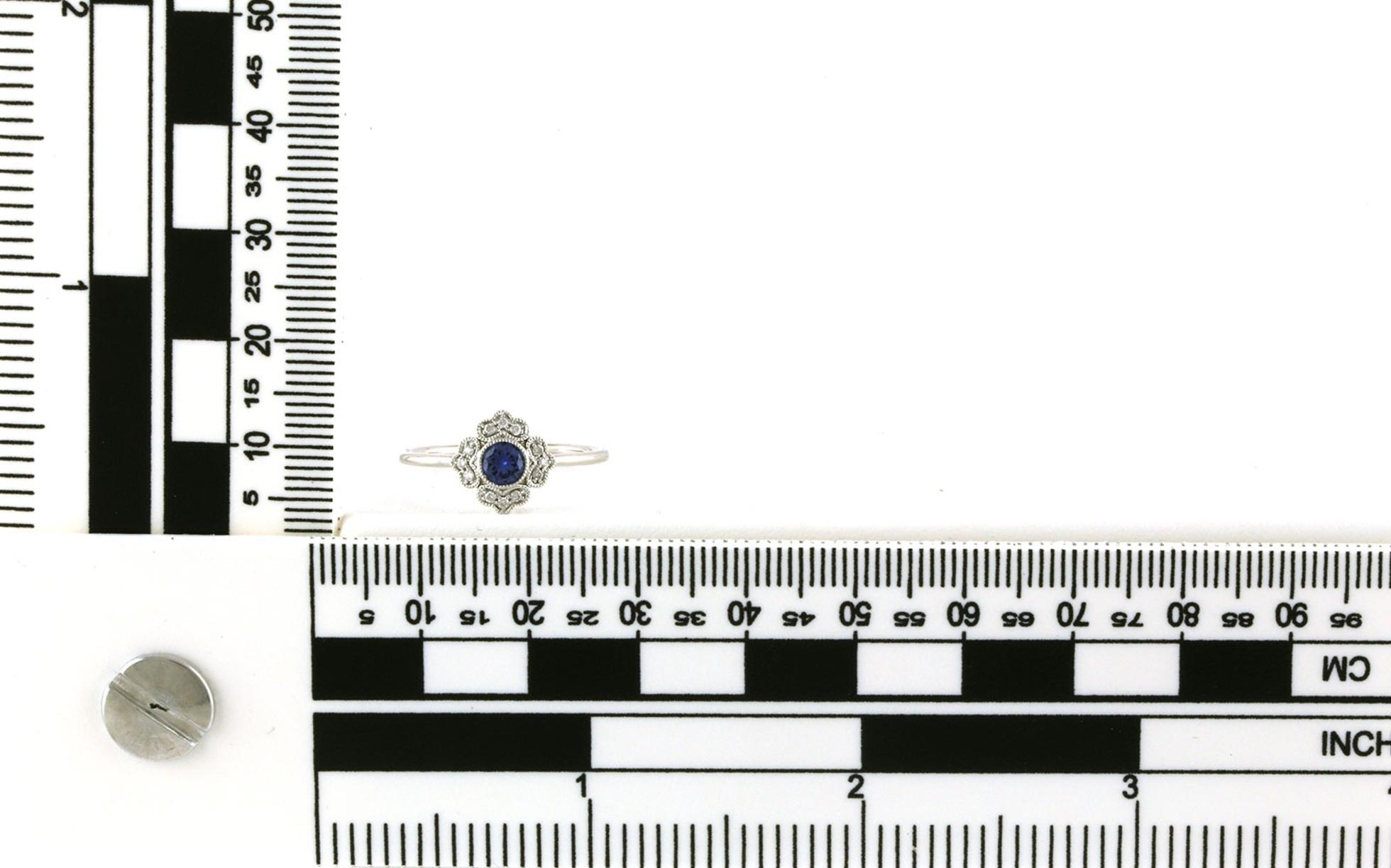 Filigree Diamond Halo Montana Yogo Sapphire Ring in White Gold (0.32cts TWT) Scale