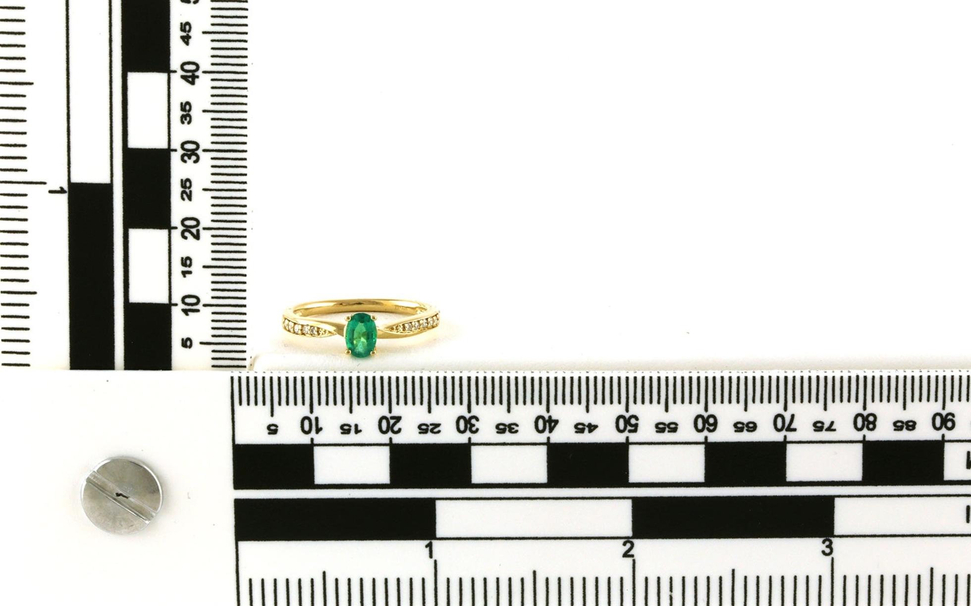 Twist Oval-cut Emerald and Diamond Ring in Yellow Gold (0.45cts TWT) scale