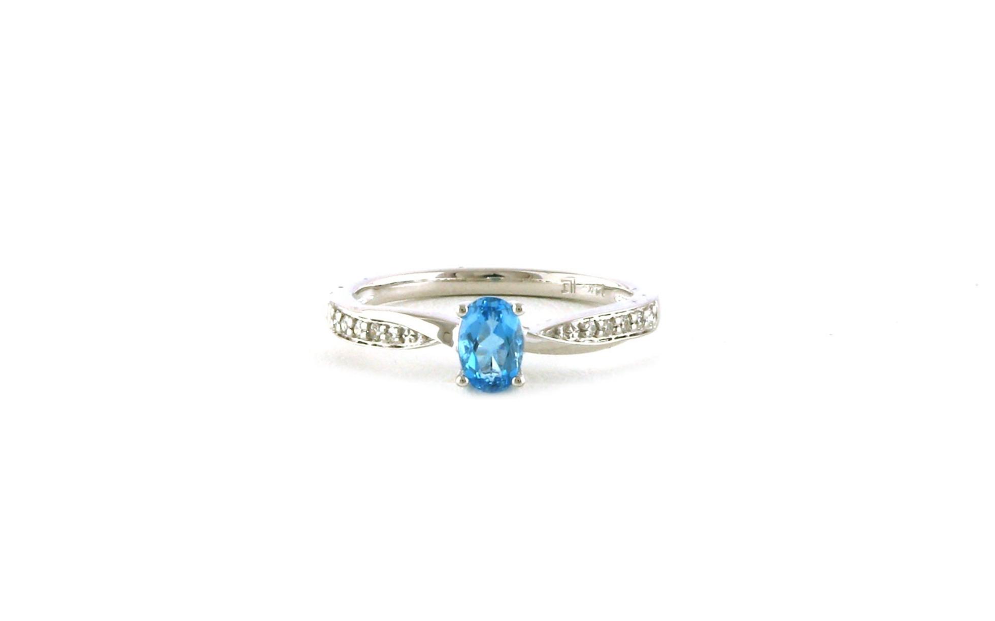Twist Oval-cut Blue Topaz and Diamond Ring in White Gold (0.60cts TWT)