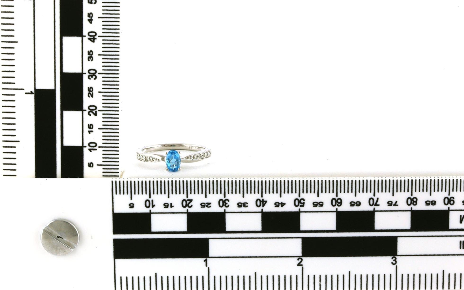 Twist Oval-cut Blue Topaz and Diamond Ring in White Gold (0.60cts TWT) scale