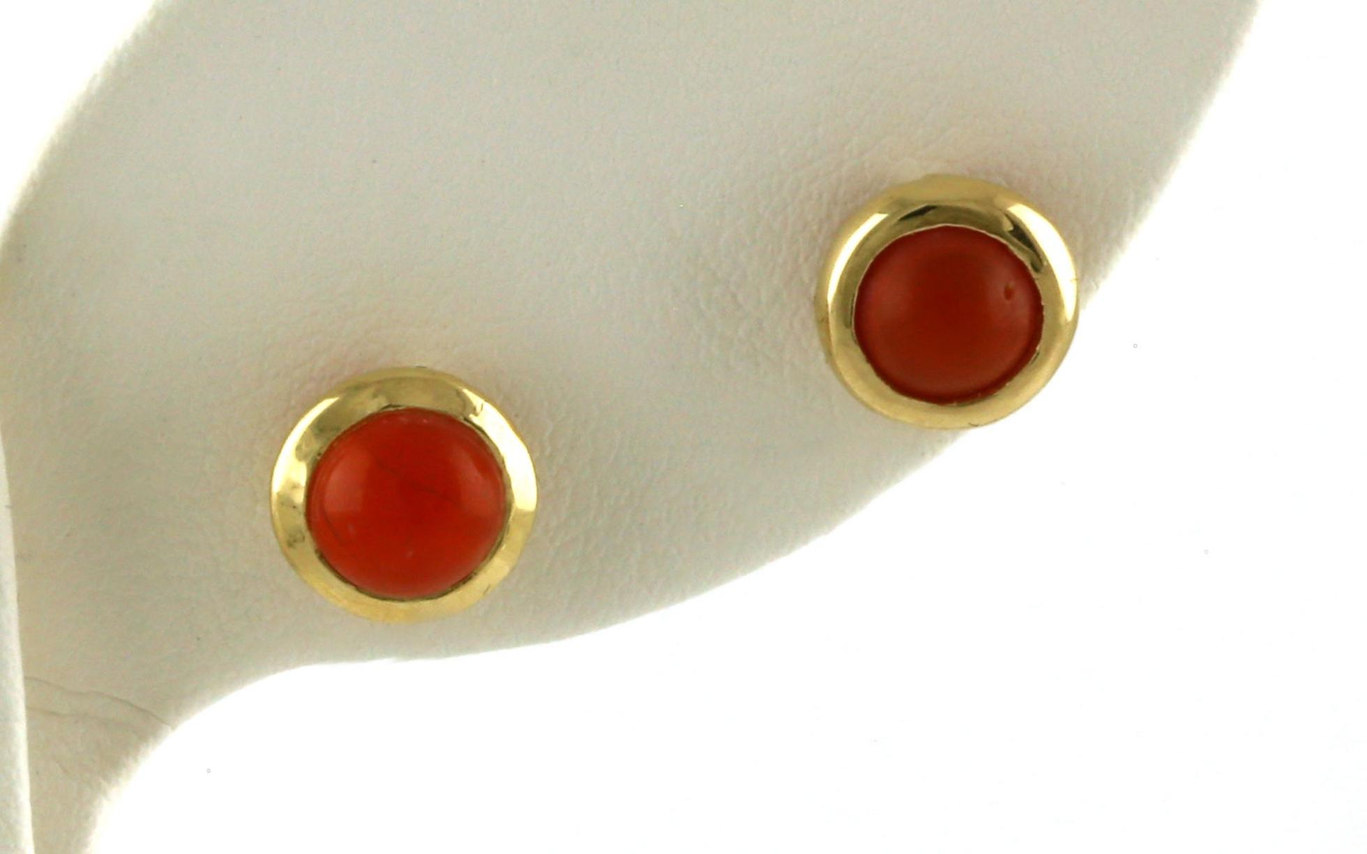 Estate Piece: Bezel-set Cabochon-cut Coral Stud Earrings in Yellow Gold