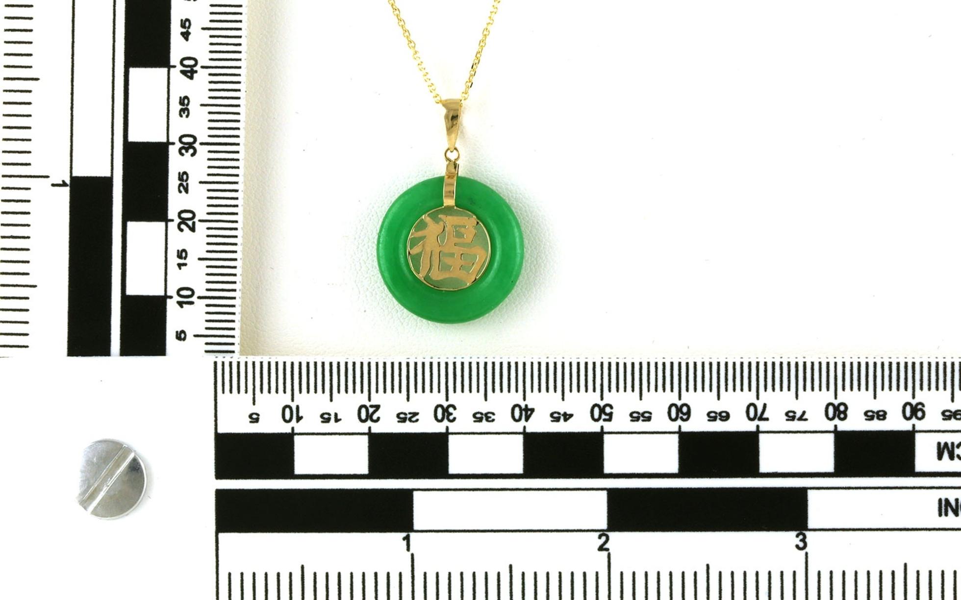 Estate Piece: Green Jade "Fortune" Charm Necklace in Yellow Gold  scale