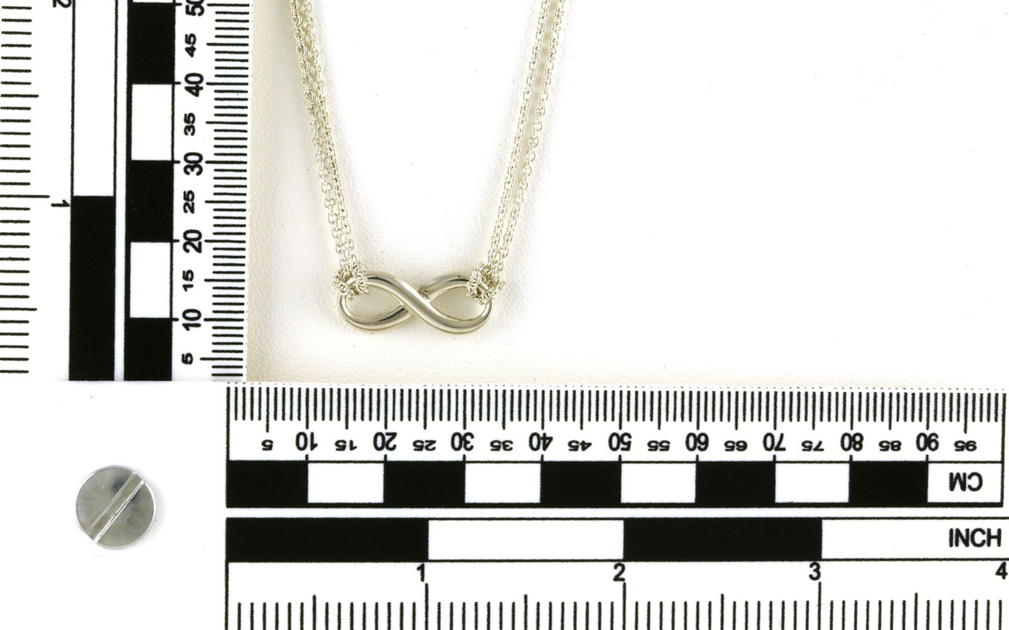 Estate Piece: Tiffany and Co. Circle Infinity Necklace with Double Chain in Sterling Silver scale