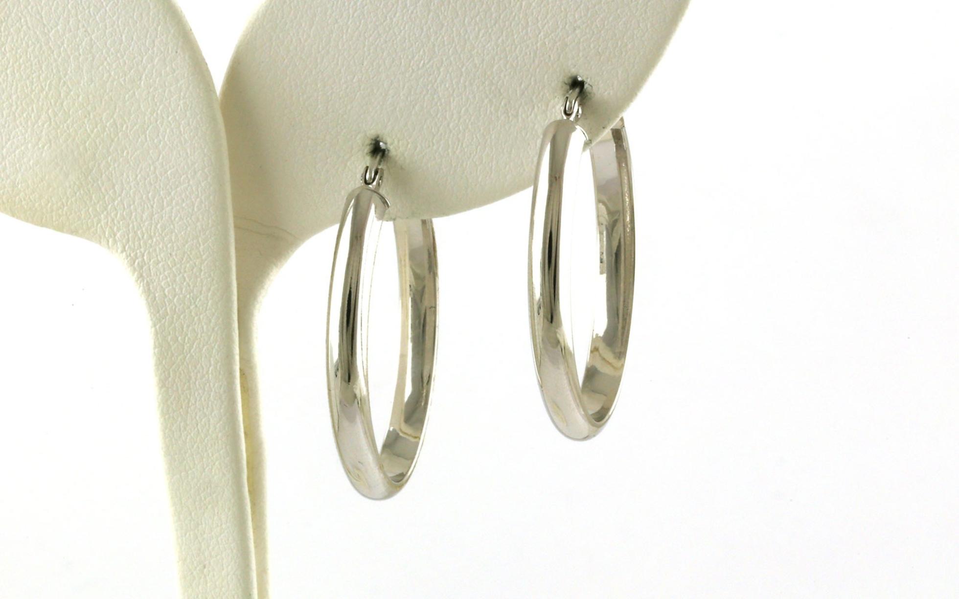 Estate Piece: Hollow Oval Hoop Earrings in White Gold