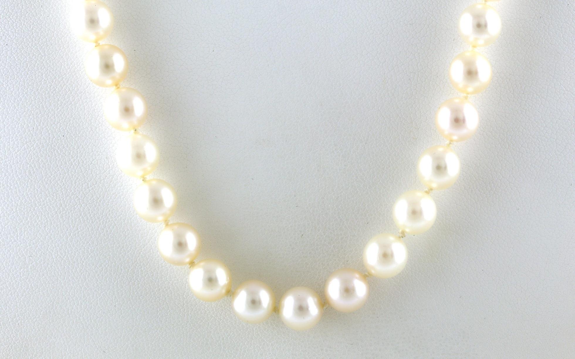 Estate Piece: Pearl Strand Necklace with Decorative Ruby and Pearl Clasp in Yellow Gold