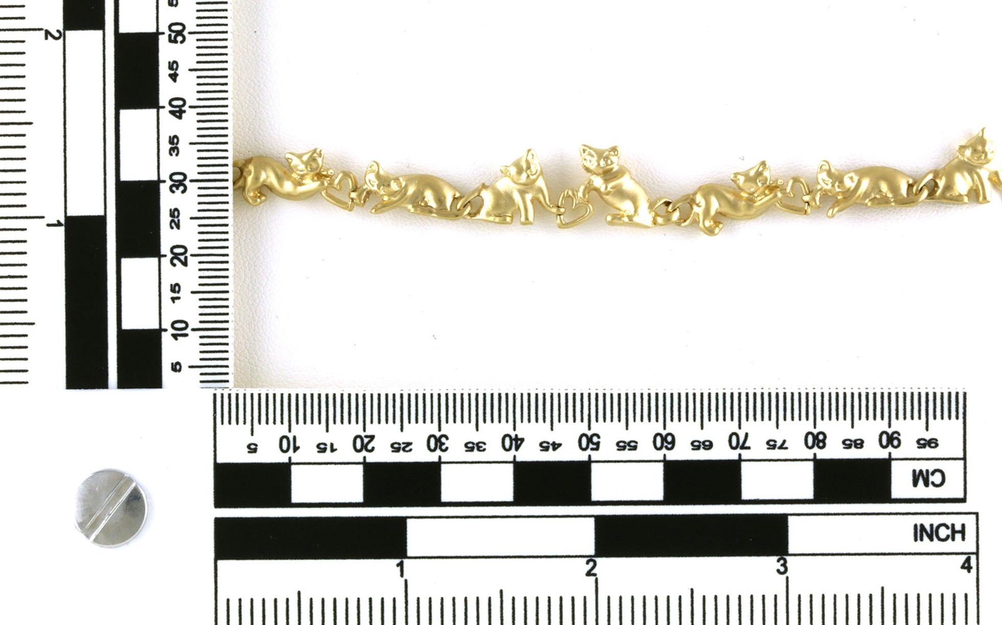 Estate Piece: Kitties and Hearts Link Bracelet in Yellow Gold scale