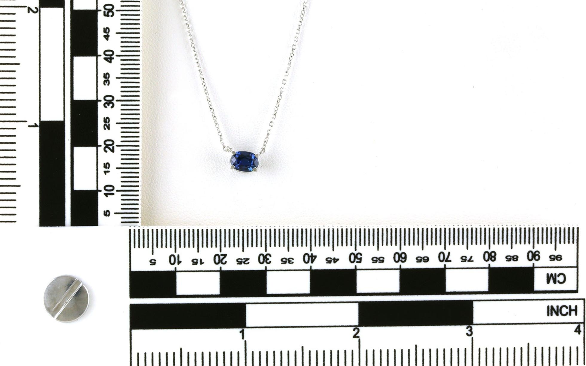 Landscape-set Oval Montana Yogo Sapphire Necklace in White Gold (0.70ct) Scale
