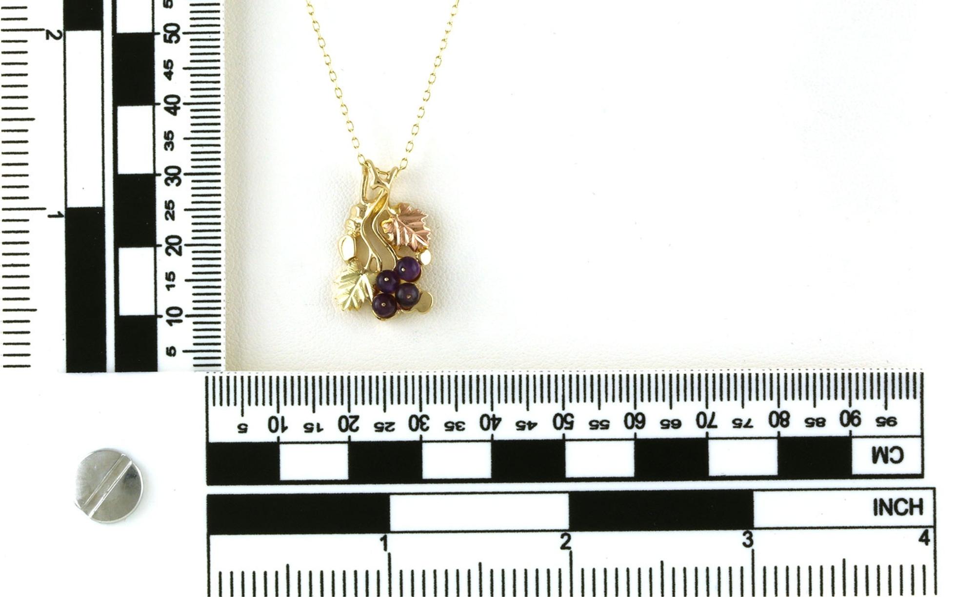Estate Piece: Amethyst Grape Vine Necklace in Two-tone Black Hills Gold scale