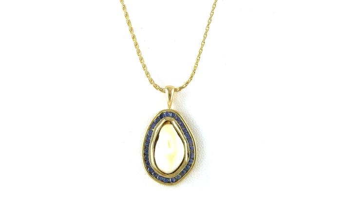 content/products/Estate Piece:  Bezel-set Elk Ivory and Channel-set Montana Yogo Sapphire Halo Necklace in Yellow Gold (0.81cts TWT)