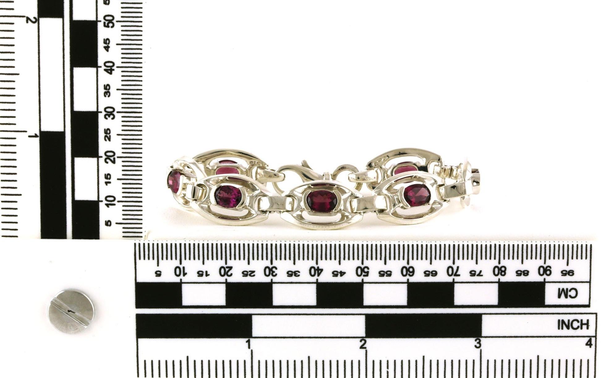 Estate Piece: Oval Link Oval-cut Garnet Line Bracelet in Sterling Silver scale