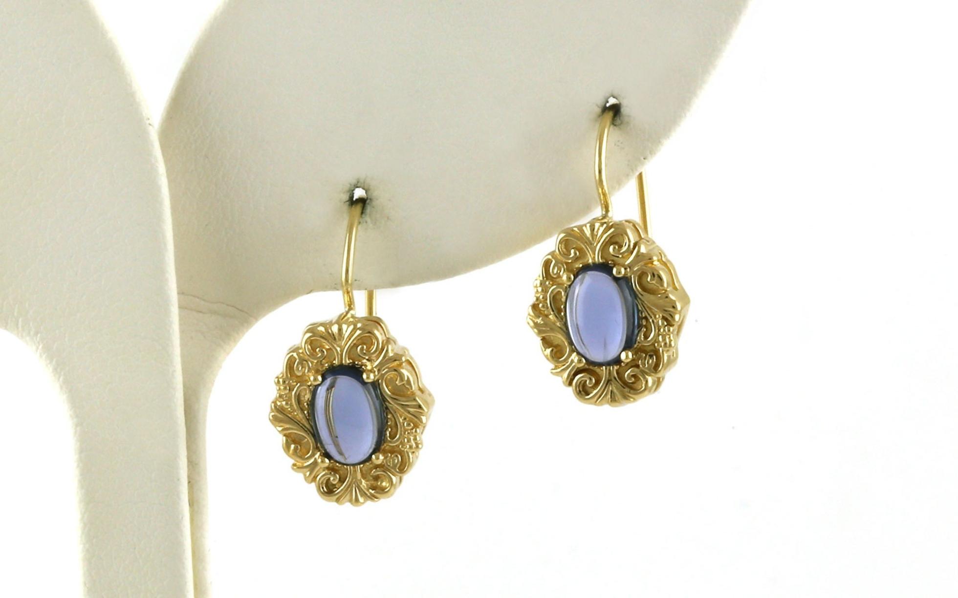 Estate Piece: Vintage-style Oval Cabochon-cut Montana Yogo Sapphire Dangle Earrings in Yellow Gold (1.50cts TWT)