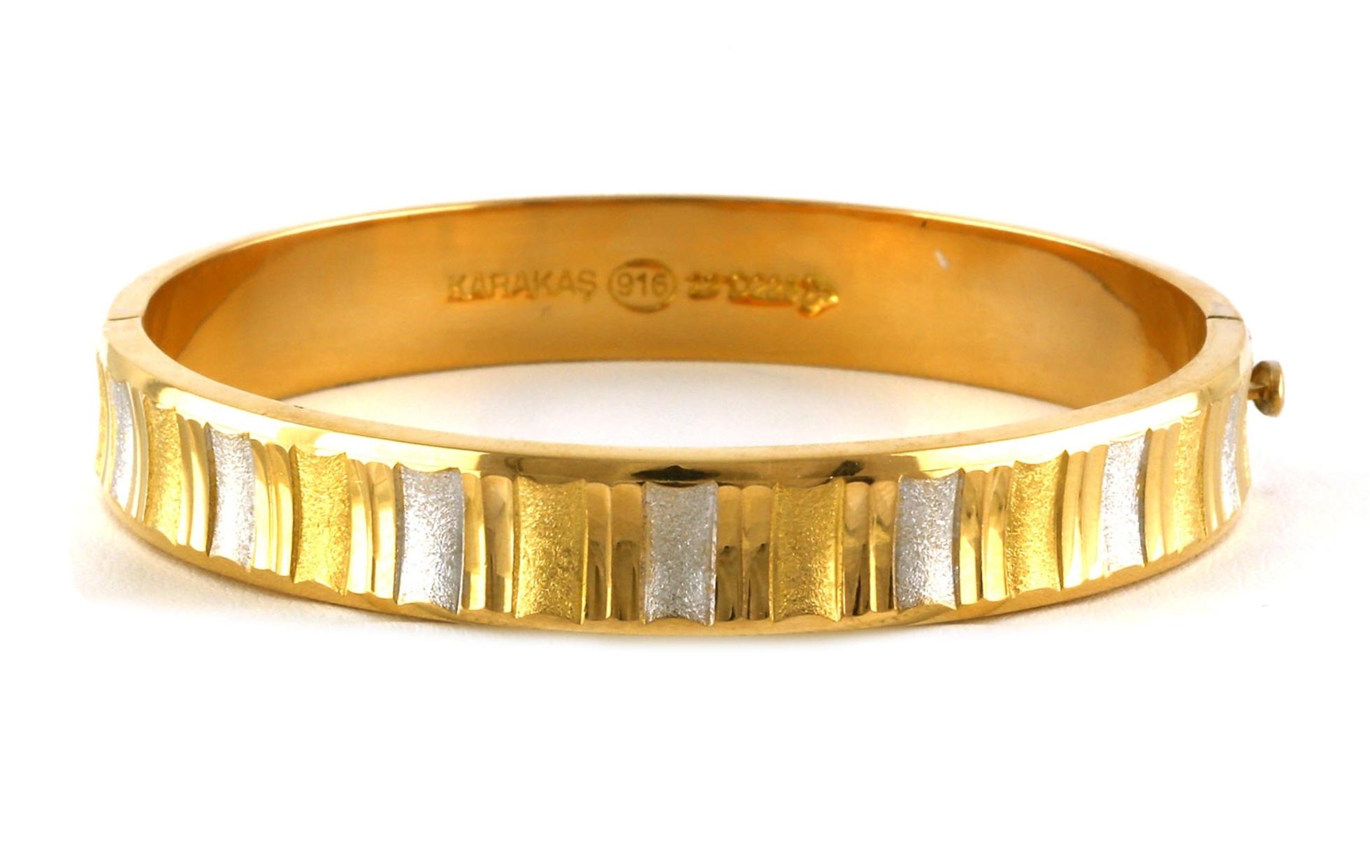 Estate Piece: Sutrons Karakas Striped Hinged Bangle Bracelet in Two-tone Rhodium Plated Yellow Gold