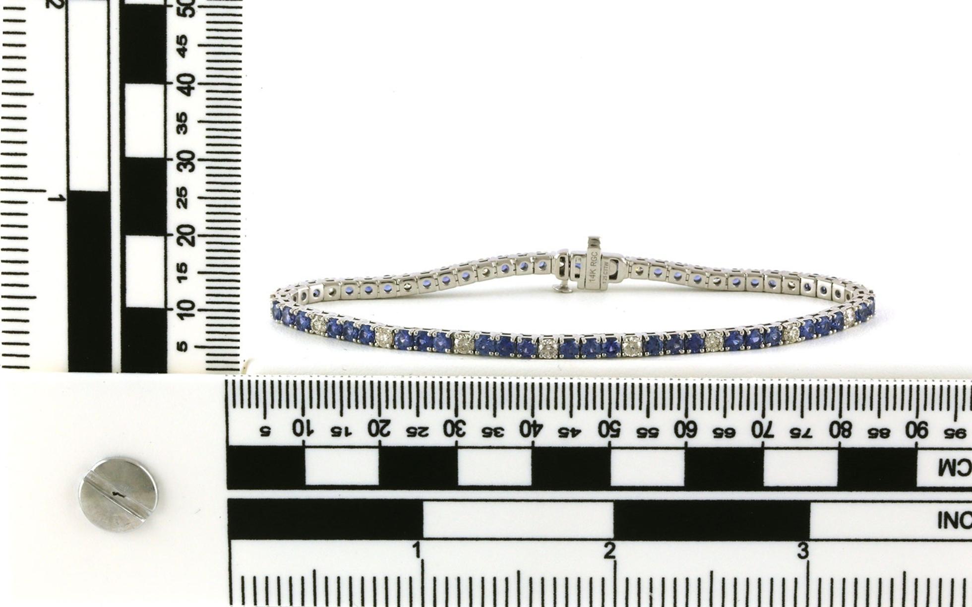 Alternating Three Montana Yogo Sapphires and One Diamond Tennis Bracelet in White Gold (7.00cts TWT) scale