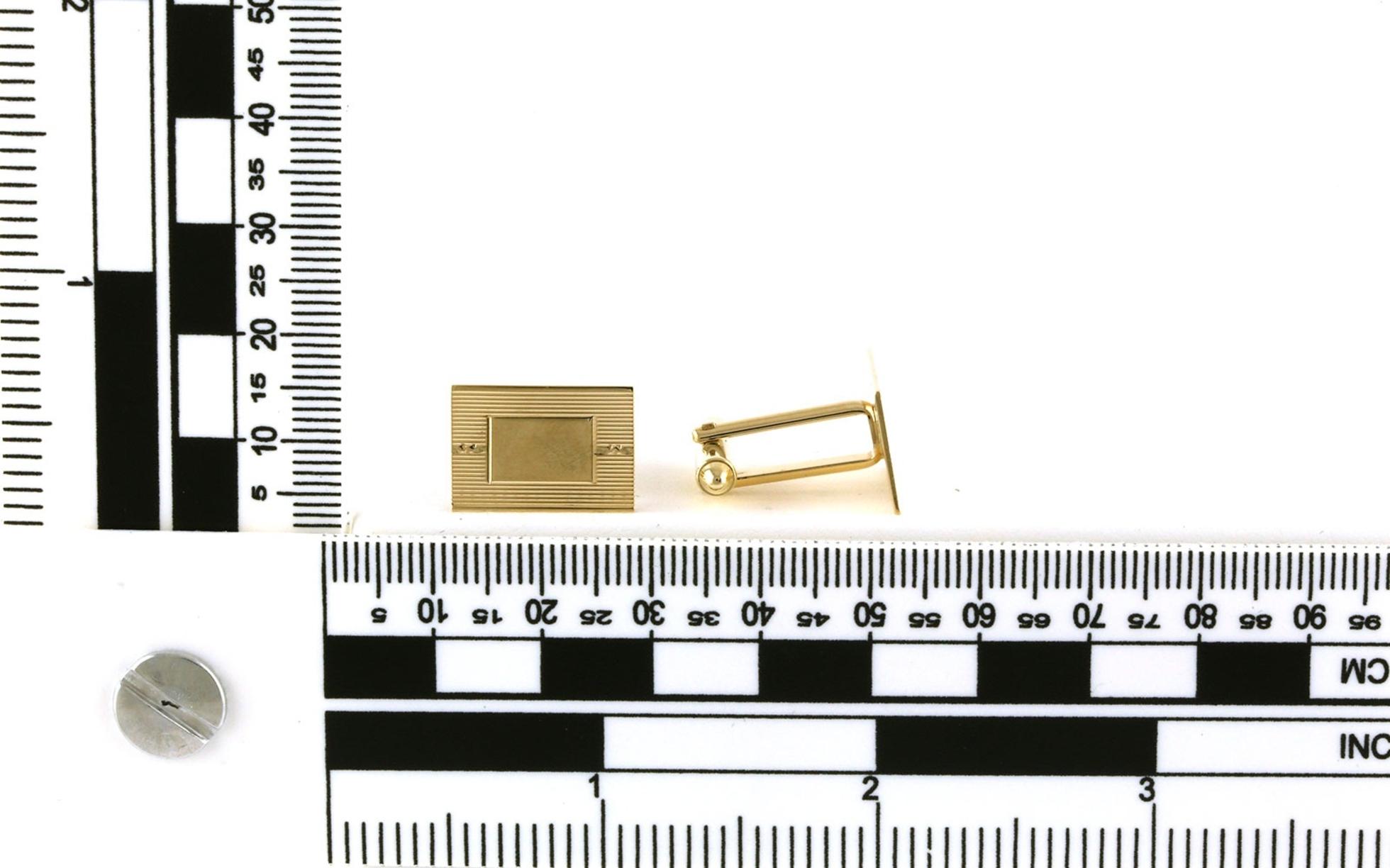 Estate Piece: Rectangular Cufflinks in Yellow with Groove Line Details Gold scale