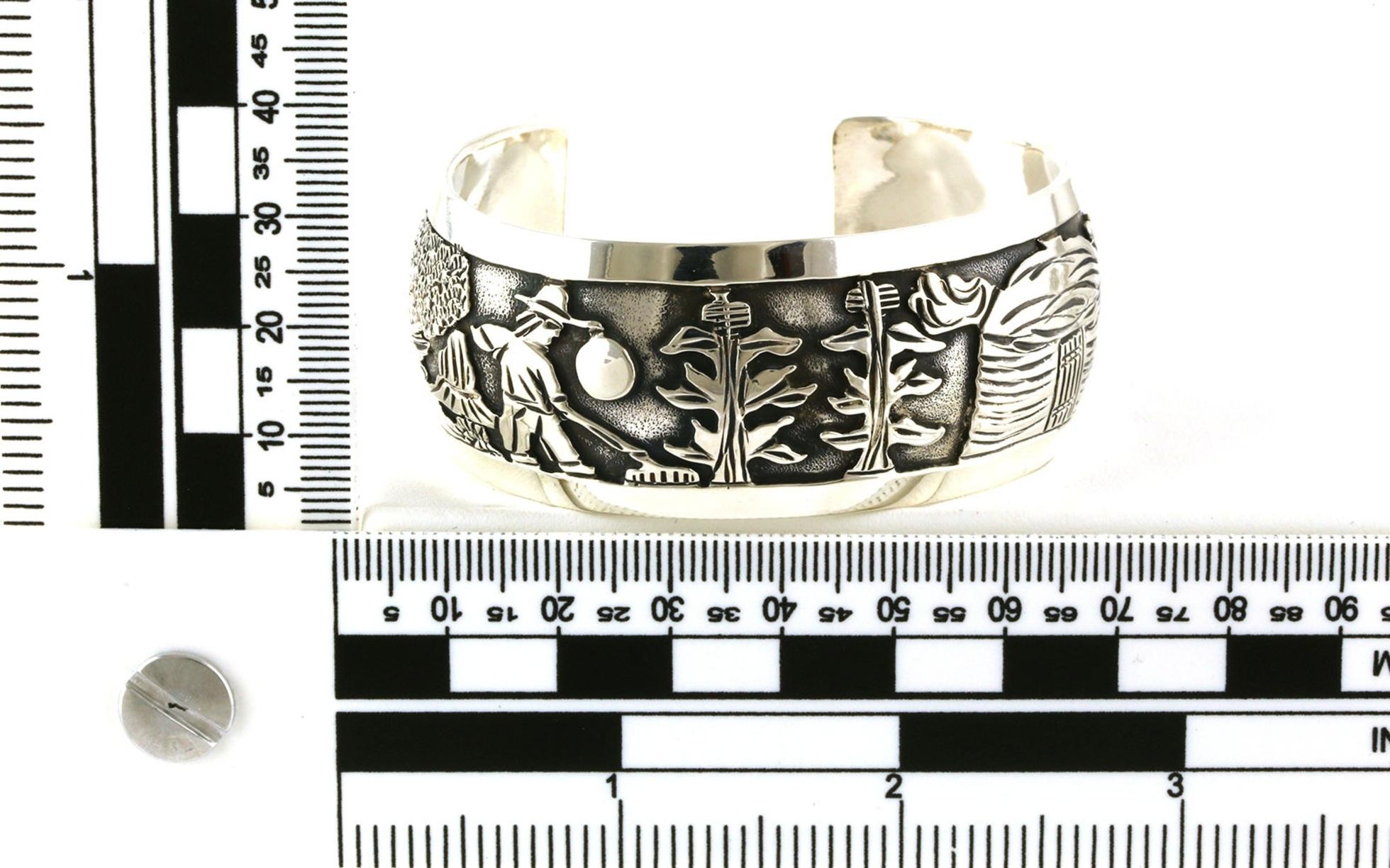 Estate Piece: Wide Farming Motif Engraved Patten Cuff Bracelet in Sterling Silver scale