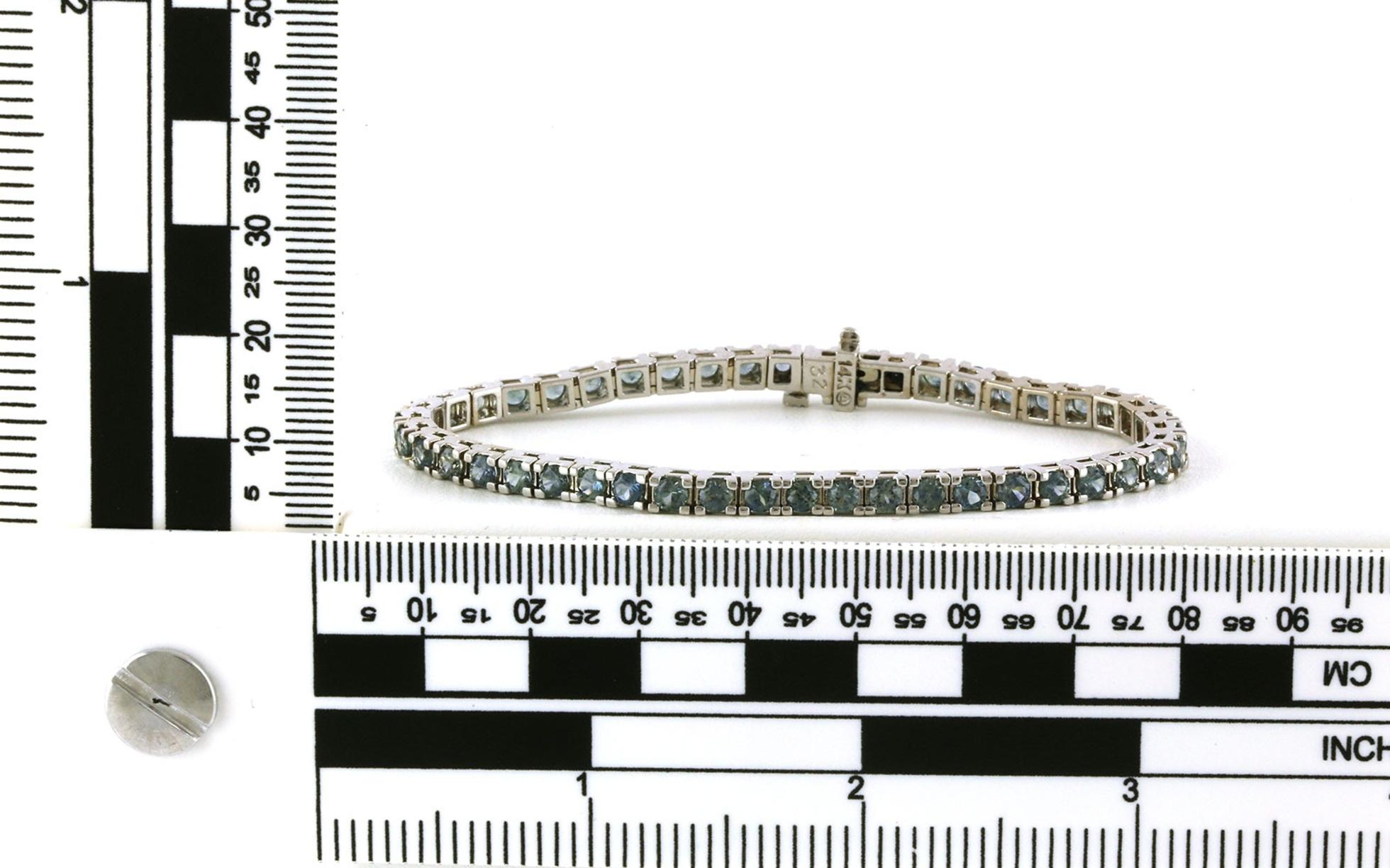 Montana Sapphire Tennis Bracelet in White Gold (5.93cts TWT) Scale