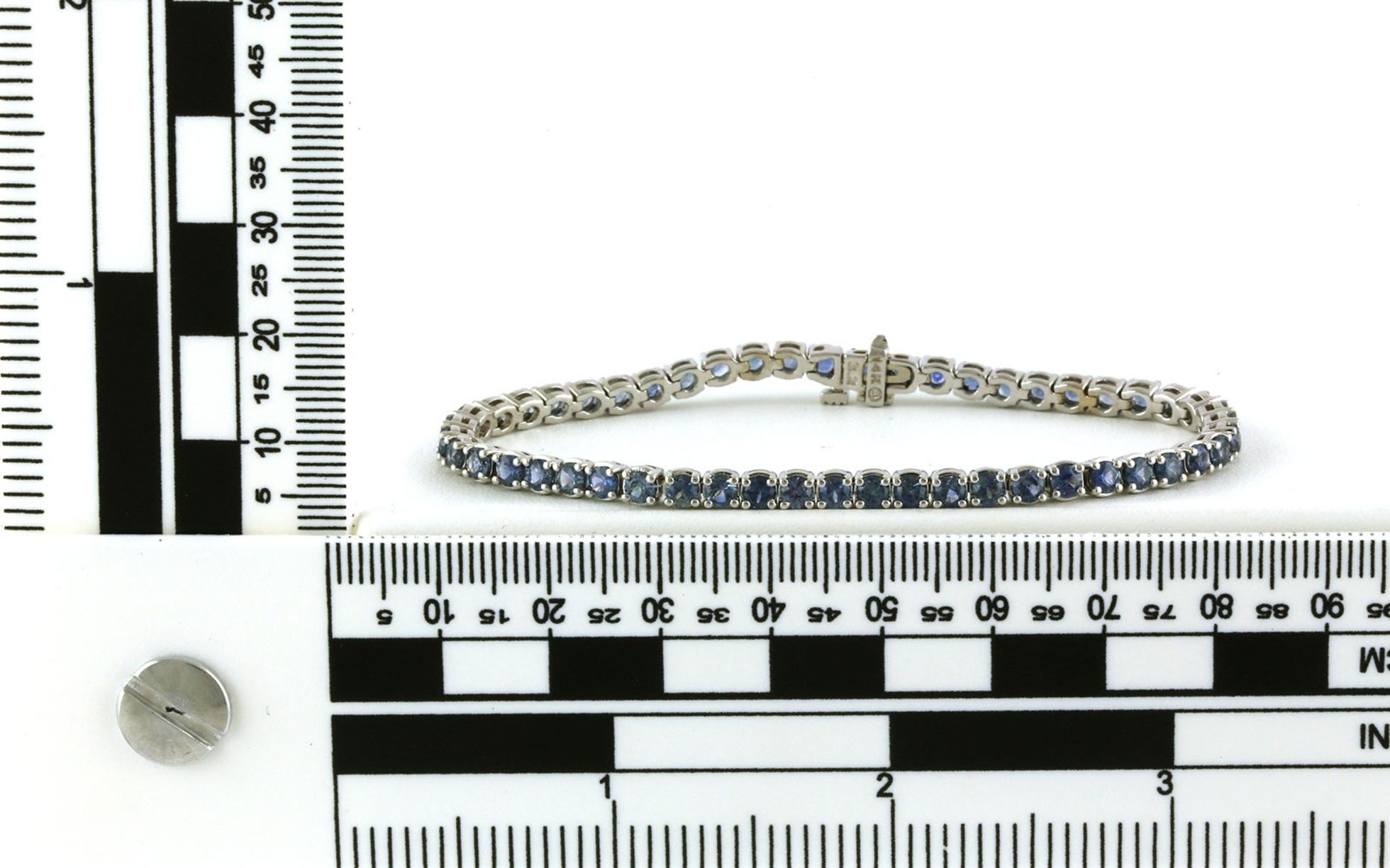 Montana Sapphire Tennis Bracelet in White Gold (6.54cts TWT) Scale