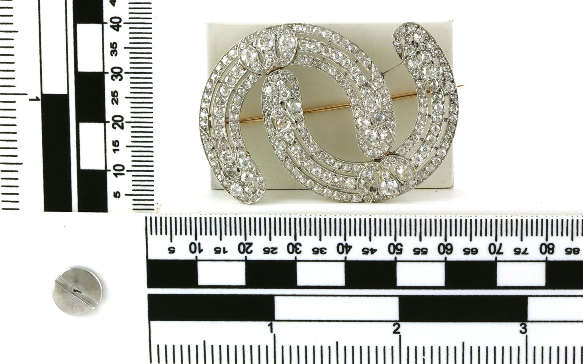 Estate Piece: Art Deco Double Curve Diamond Pin in Platinum (6.00cts TWT)