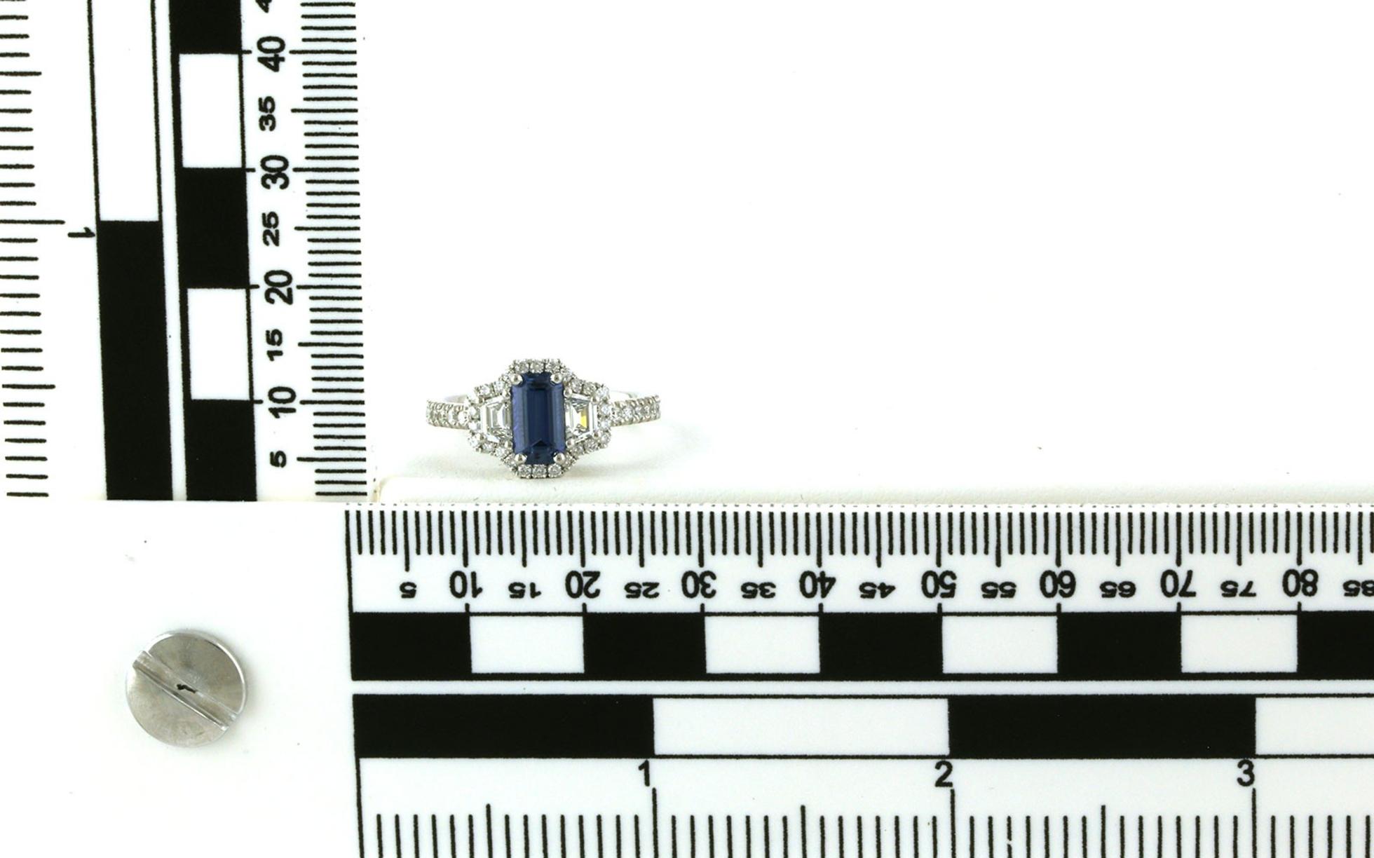 3-Stone Halo Emerald-cut Montana Yogo Sapphire and Trapezoid-cut Diamond Ring in White Gold (1.81cts TWT) scale