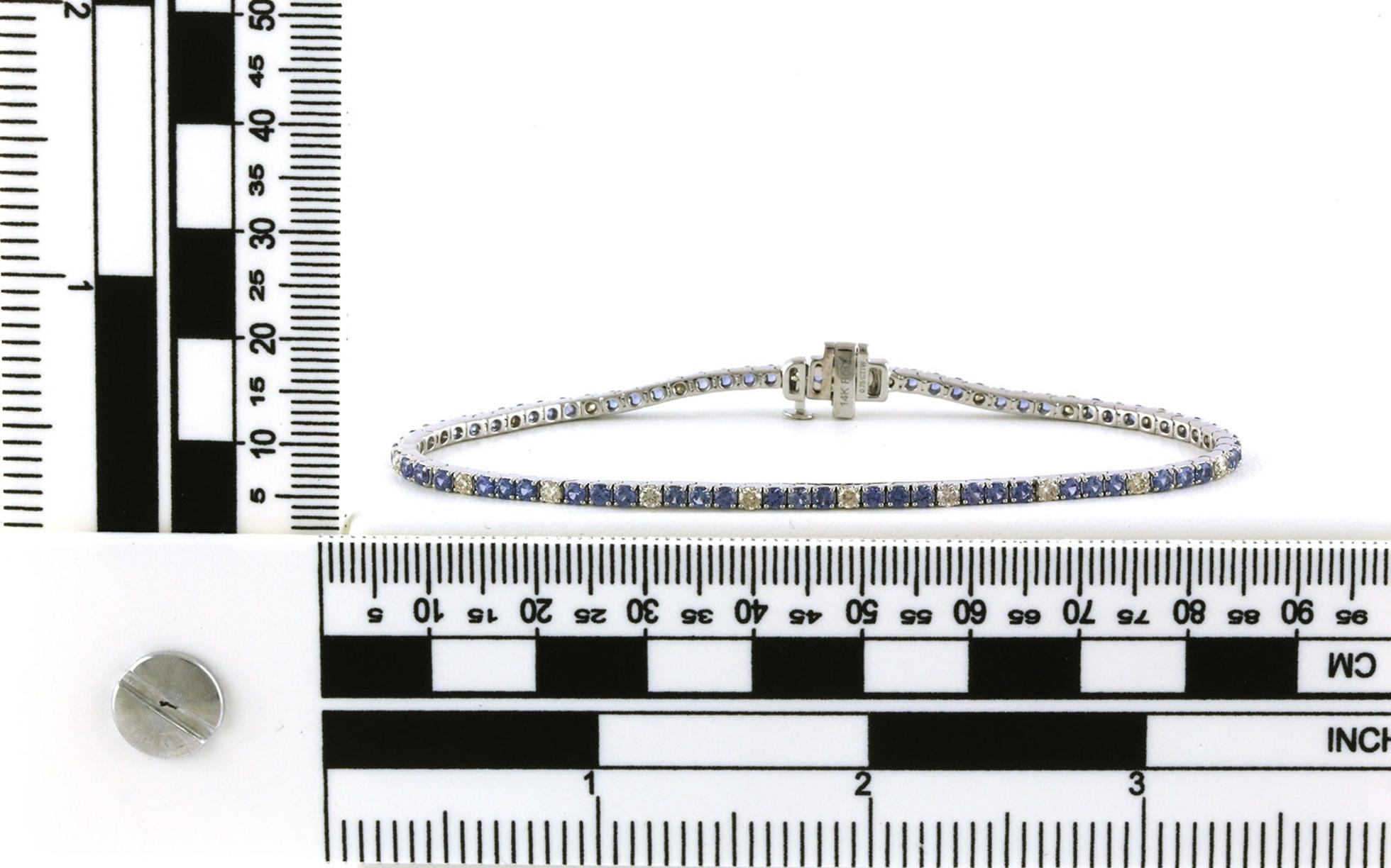 Alternating Three Montana Yogo Sapphires and One Diamond Tennis Bracelet in White Gold (3.08cts TWT) scale