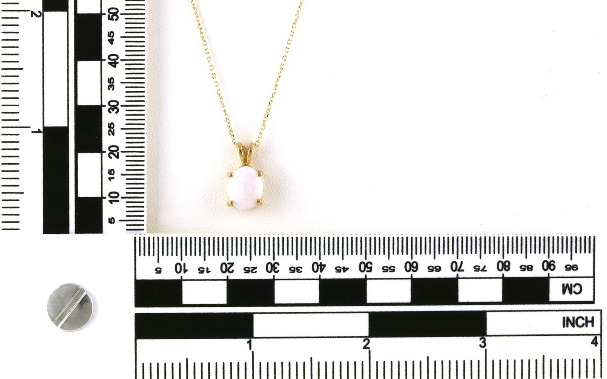 Estate Piece: Solitaire-Style Oval Cabochon Opal Necklace in Yellow Gold scale