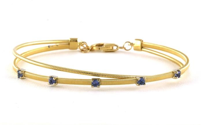 content/products/2-Row Crossover 5-Stone Montana Yogo Sapphire Bangle Bracelet in Yellow Gold (0.35cts TWT)