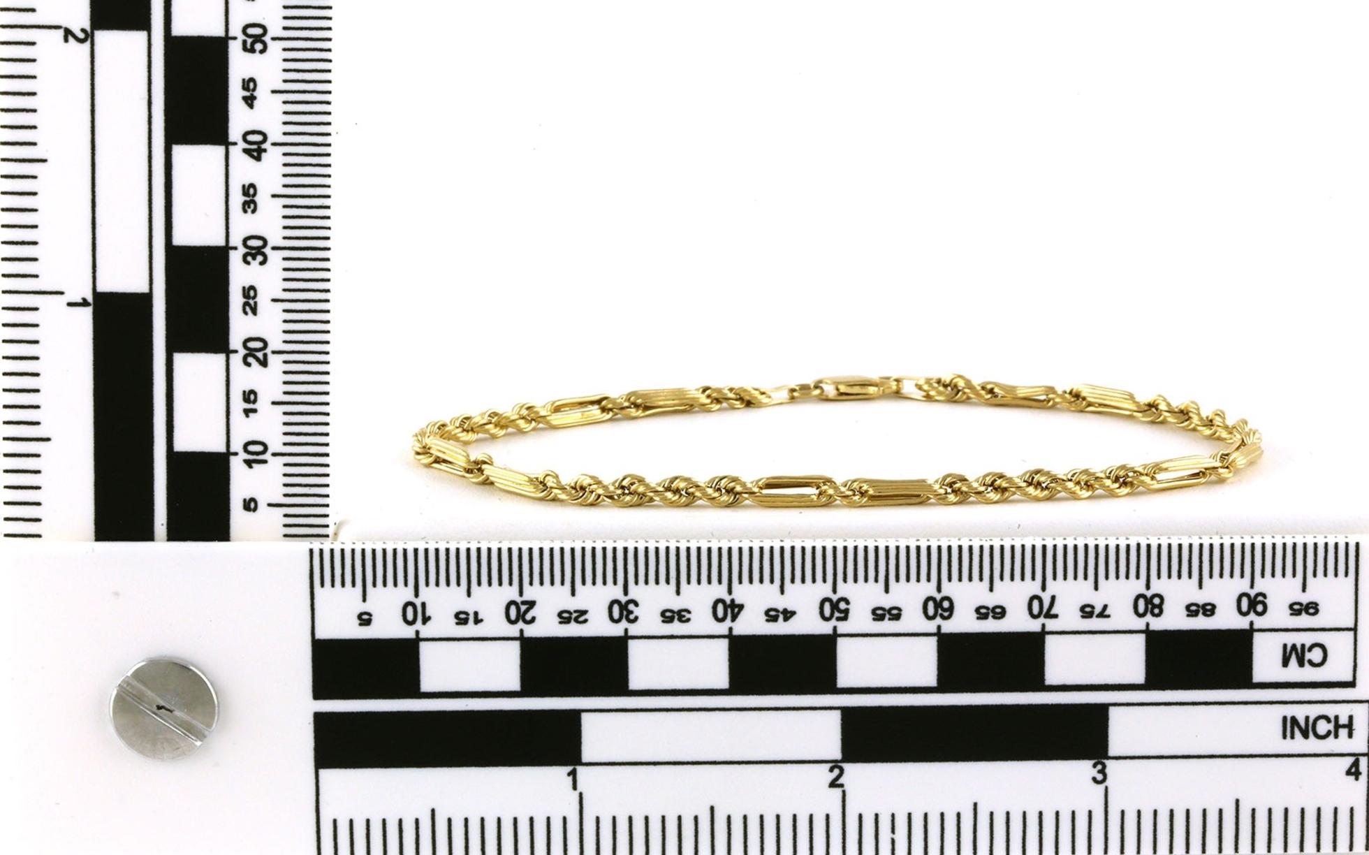 Estate Piece: Hollow Fancy Link Bracelet in Yellow Gold Scale