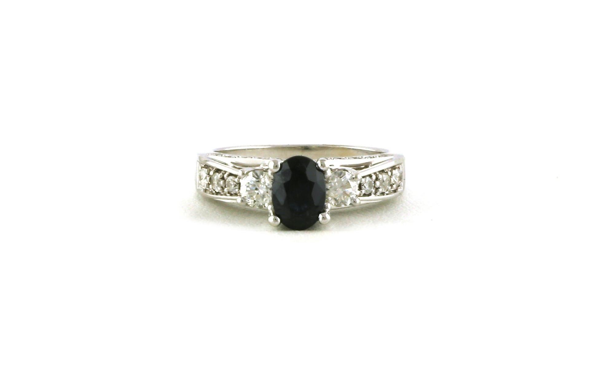 Estate Piece: 3-Stone Oval-cut Sapphire and Diamond Ring with Channel-set Accents in White Gold (1.50cts TWT)