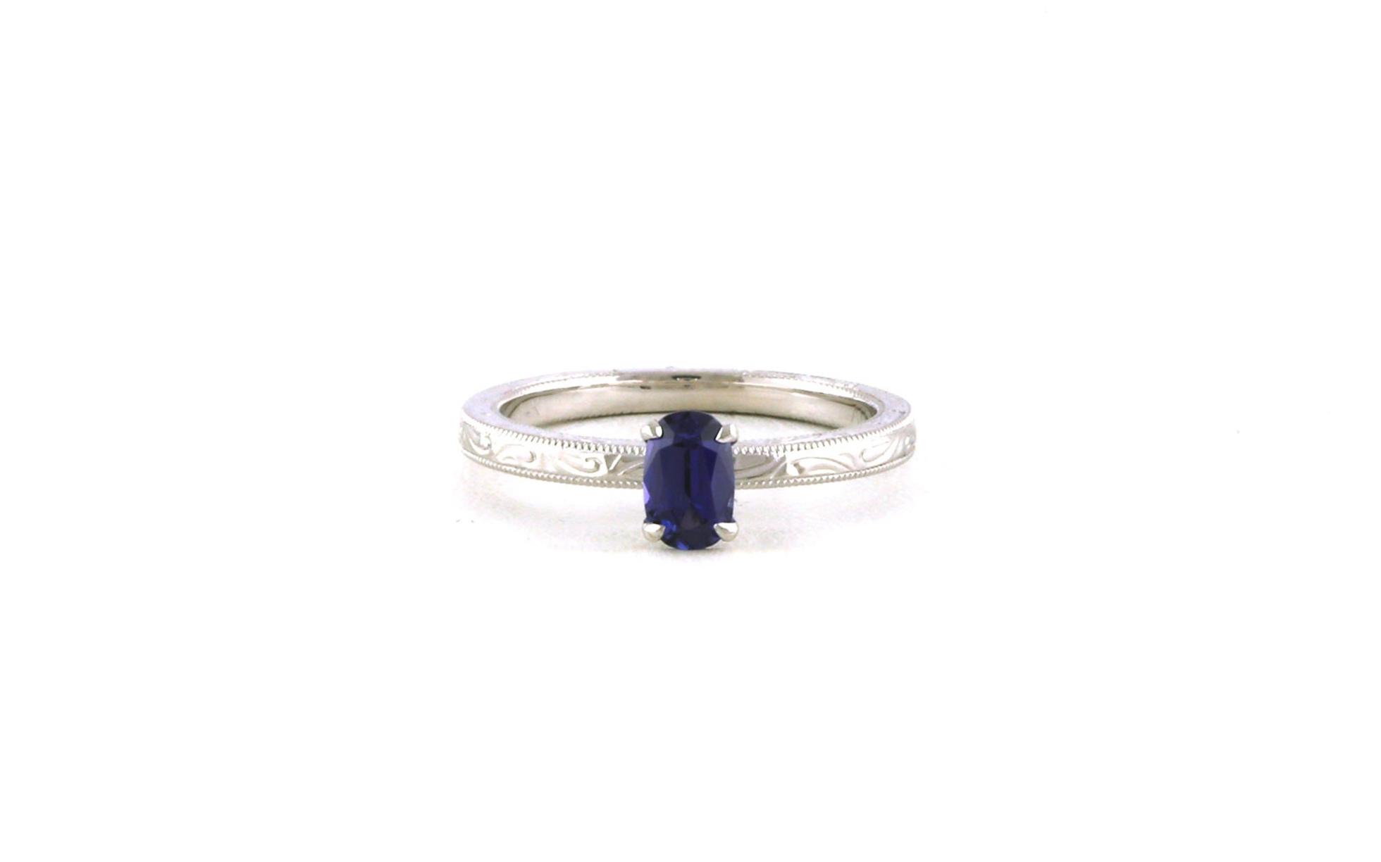 Hidden Halo Oval-cut Huckleberry Sapphire and Diamond Ring with Hand Engraving Details in White Gold (0.54cts)