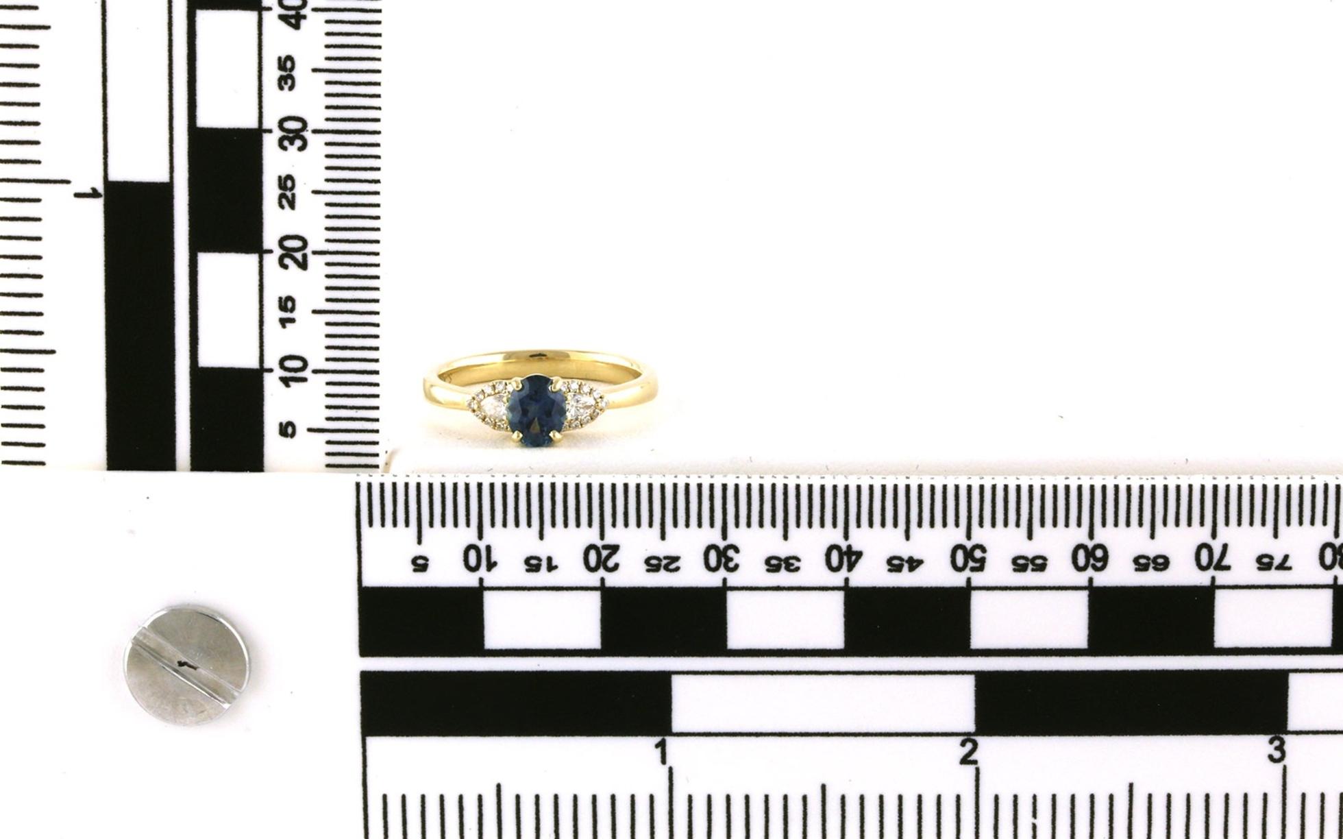 3-Stone style Oval-cut Montana Sapphire and Pear Halo Side Diamond Ring in Yellow Gold (0.94cts TWT) scale