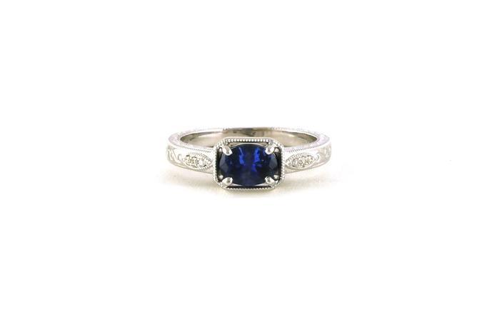 content/products/Solitaire-style East-West Oval-cut Montana Sapphire Ring with Hand Engraving and Milgrain Details in White Gold (0.94cts)