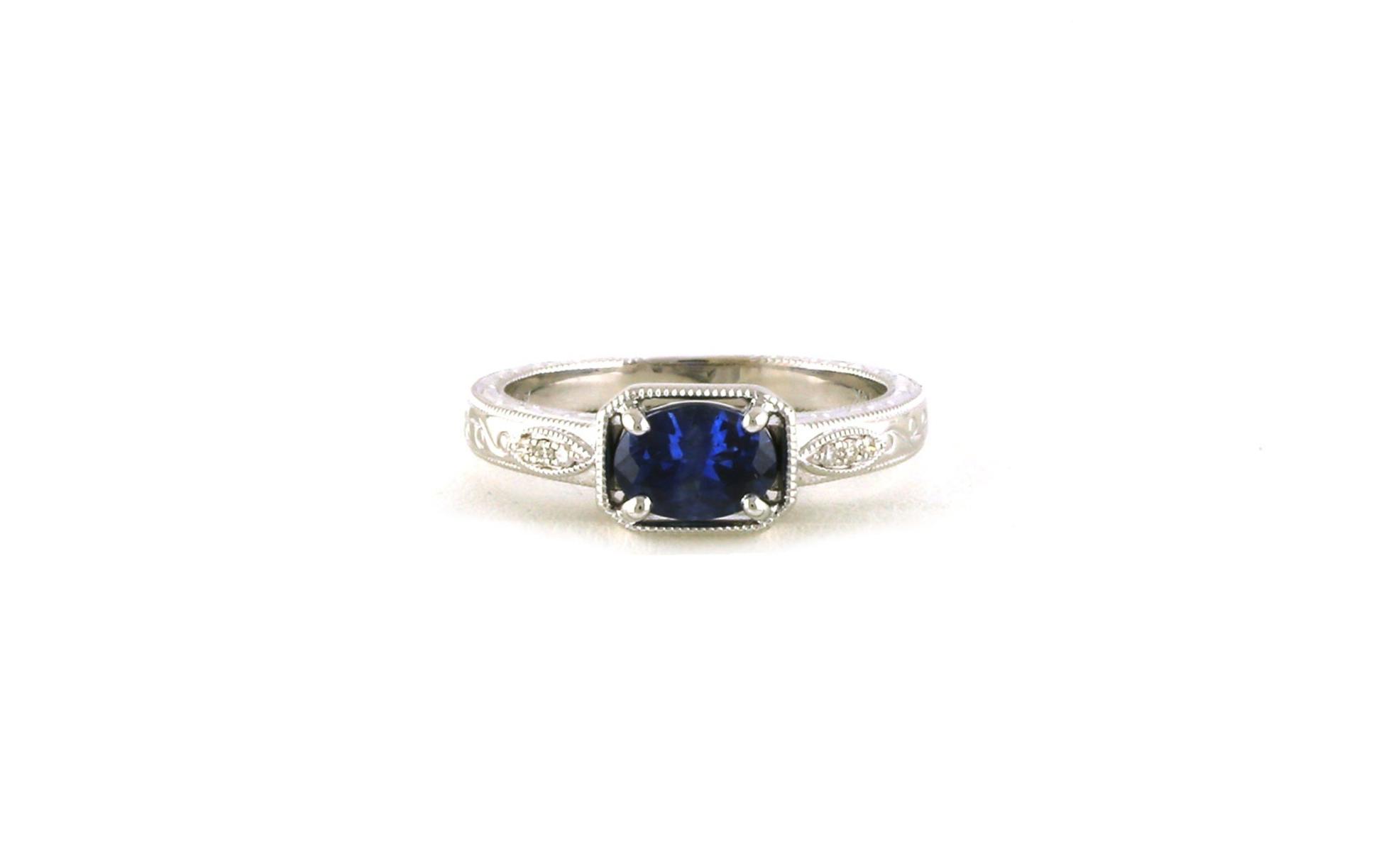 Solitaire-style East-West Oval-cut Montana Sapphire Ring with Hand Engraving and Milgrain Details in White Gold (0.94cts)