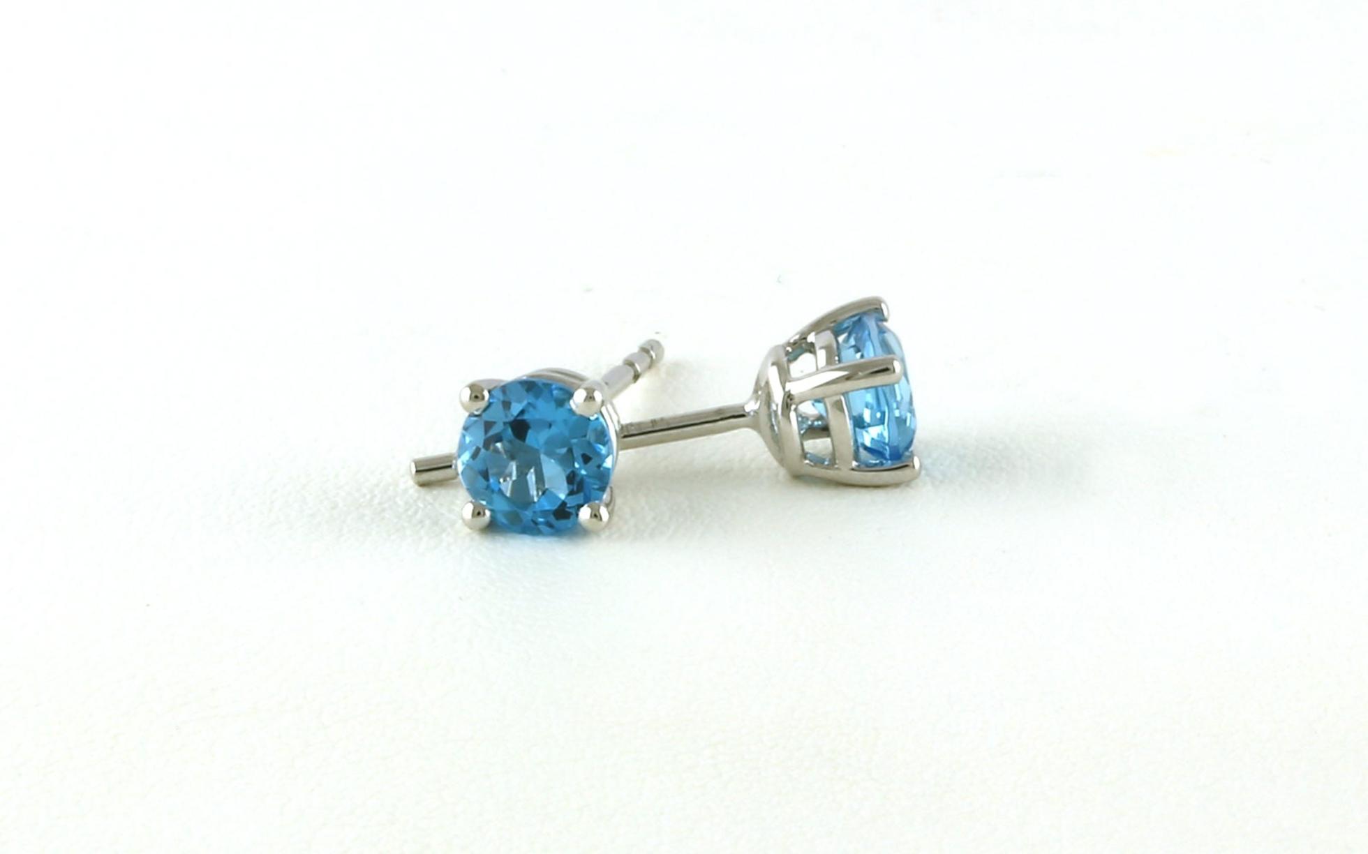 Solitaire-style 4-Prong Blue Topaz Stud Earrings in White Gold (0.94cts TWT) side