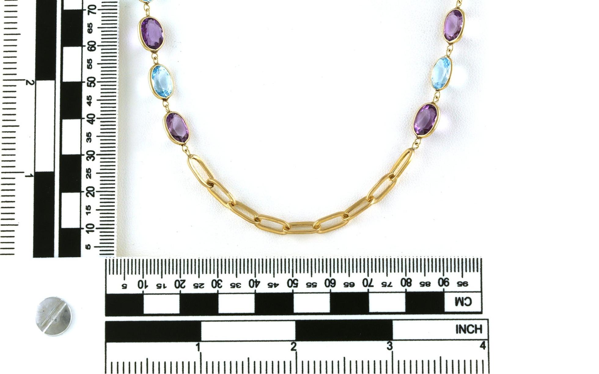 Estate Piece: Long Bezel-set Oval Blue Topaz and Amethyst Paperclip Chain Station Necklace in Yellow Gold  scale