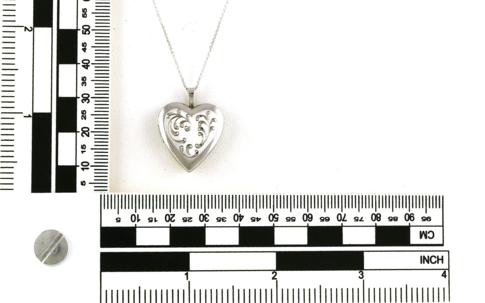 Estate Piece: Heart Locket Necklace with Floral Engraved Details in White Gold scale